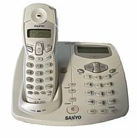 Handset seated in base showing keypad and displays