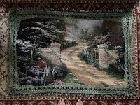 Full view of woven throw showing entire Kinkade scene and fringe