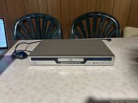 Front view of Kodak DVD-802 DVD player on table