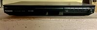 Front view showing Panasonic branding, disc tray, control buttons