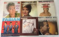 Six LP jackets laid out, five relevant to lot
