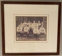 Front view of framed sports team photo reprint