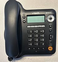 Front view of VTech CD1291 phone showing keypad, LCD and handset