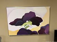Full view of framed abstract floral painting on wall
