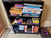 Full view of shelves with games and puzzle cubes