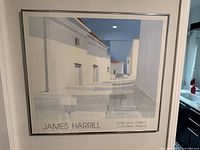 Full framed James Harrill poster on wall