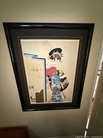 Full view of framed print on wall.