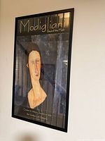 Full view of framed poster on wall