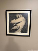 Full view of framed print on wall