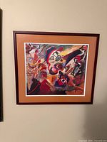Full view of framed Kandinsky reproduction print on wall