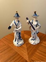 Front view of both figurines showing details and size