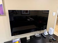 Front view of wall-mounted Panasonic 50-inch TV