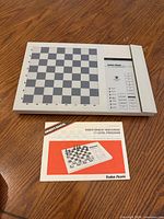 Top view of chess computer and manual