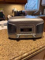 Front view of TEAC SL-D96 showing digital display, speaker grilles, control knobs