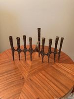 Front view of Wainberg brutalist nine-branch menorah showing overall design and finish