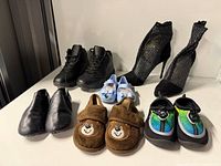 Six pairs of shoes displayed on tabletop