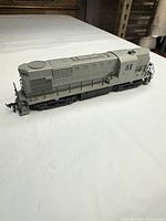 Side view of gray primer HO diesel locomotive