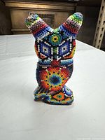 Front angled view showing full bead mosaic surface