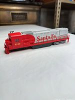 Right side view showing Santa Fe lettering and 8130 cab number