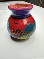 front view of multicolor hand-painted ceramic vase