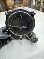 Front view showing dial, CAGE knob and overall face