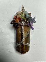 Front view showing full Tree of Life design and multistone accents