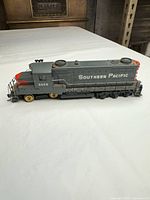 Left side view showing Southern Pacific lettering and overall wear