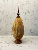 Full view of spalted maple sculpture with finial