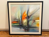 Full view of framed painting on floor