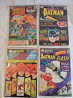 Group shot of all four bagged comics