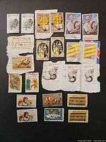 All 23 stamps laid out on black background