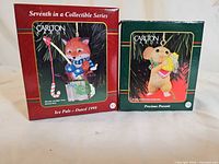 Front of both ornament boxes: Ice Pals and Precious Present