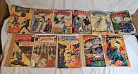 Group shot of all 11 DC comics laid out