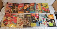 Fifteen bagged Gold Key comics laid out in two rows
