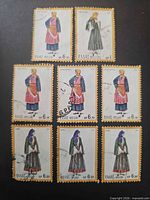 Eight Greek traditional costume stamps arranged in grid