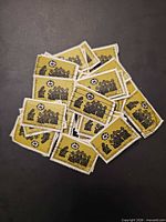 Front view of pile of Emmanuel 4c stamps