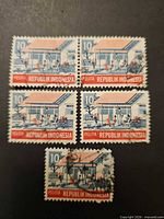 Front view of all five Indonesian Pelita 10 stamps