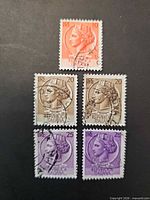 Front view of five Italia Turrita stamps showing denominations and cancellations