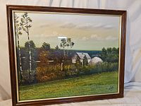 Front view of framed Sanford Fisher painting showing prairie farm landscape and signature