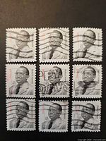 Front view of nine canceled Jonas Salk 63¢ stamps