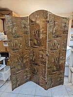 Full view of 3-panel screen unfolded showing nautical fabric and arched top