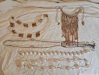 All five necklaces laid out for overview