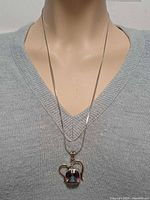 Necklace on mannequin showing pendant drop and chain length