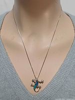 Necklace on mannequin showing full length and pendant size