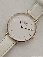 Front view of watch showing dial and strap