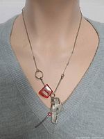 Necklace on mannequin showing wear length and pendant arrangement