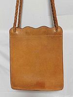 Front view showing Bree logo, scalloped top edge