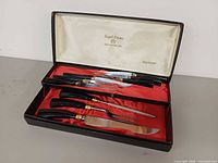 Open case showing full set of cutlery pieces