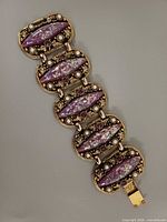 Top view showing six cabochon links, clasp visible