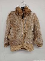 Full front view of jacket on hanger